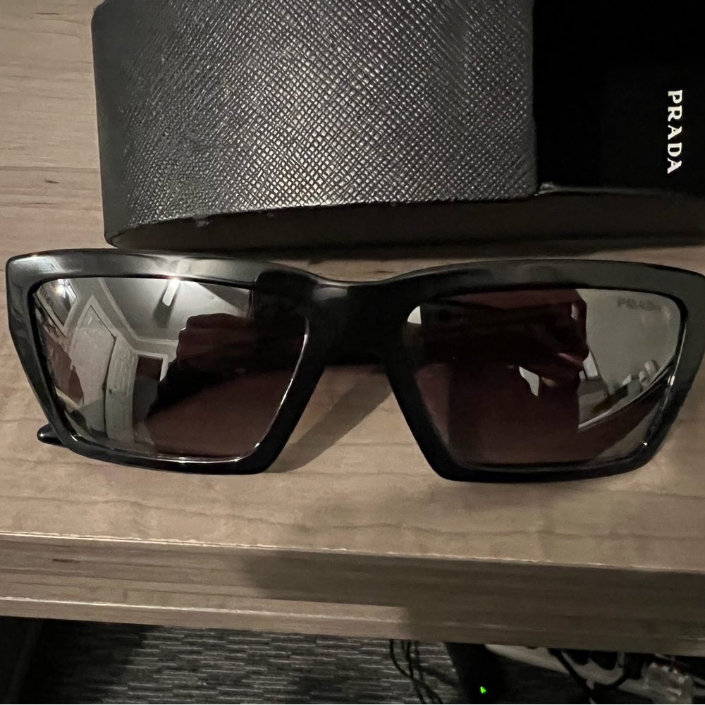 Womens Prada Sunglasses New in original case black frame